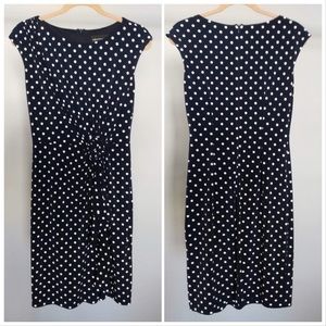 Navy polka dot dress. Great for Fall parties.